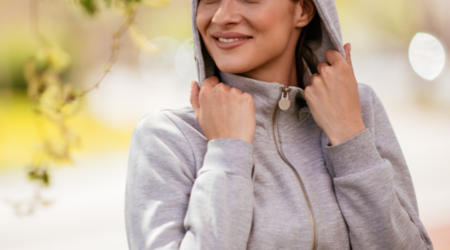 Woman in recycling hoodie
